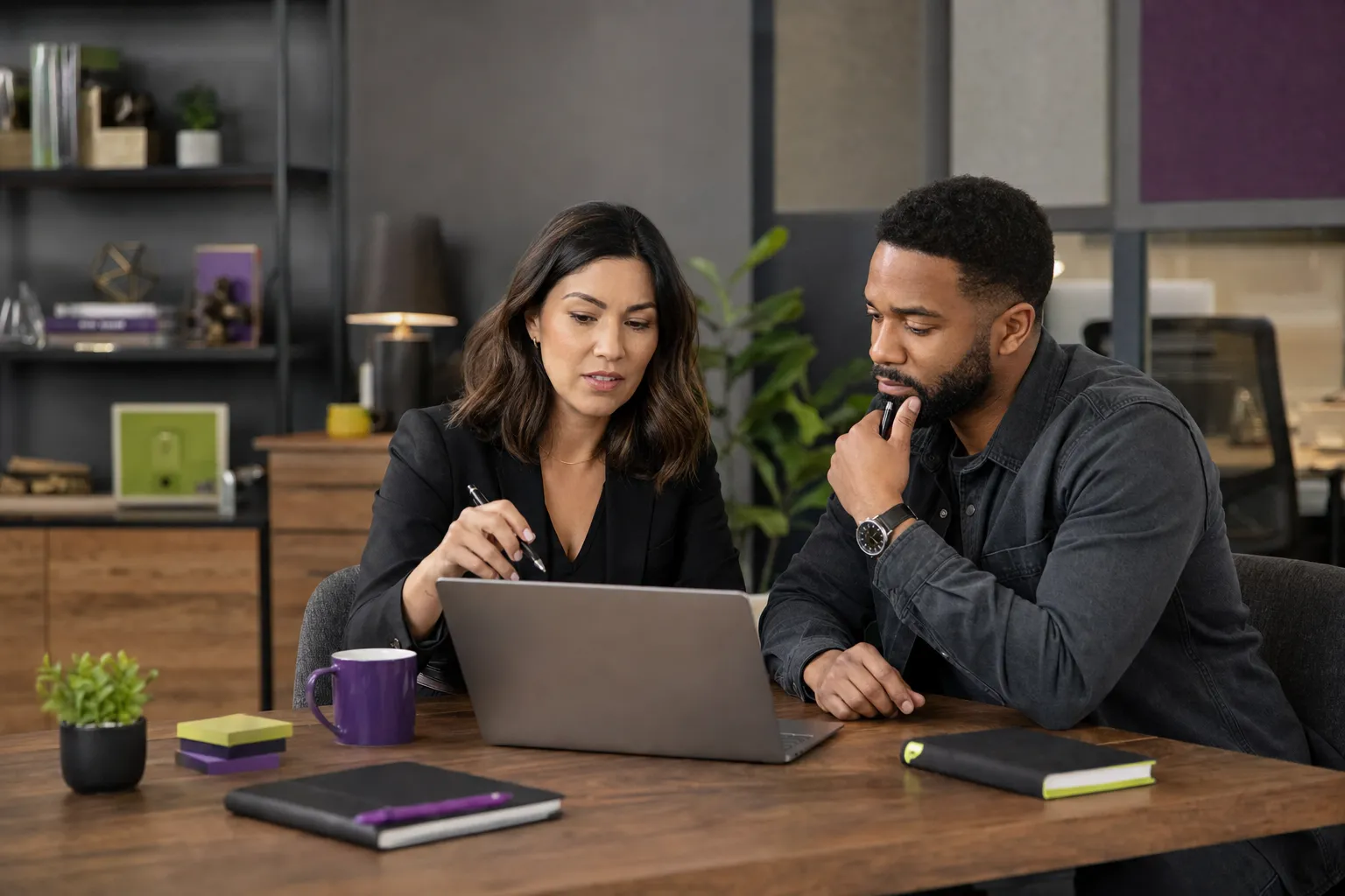 Business owner reviewing GEO content and AI search opportunities with a strategist for a Canadian business